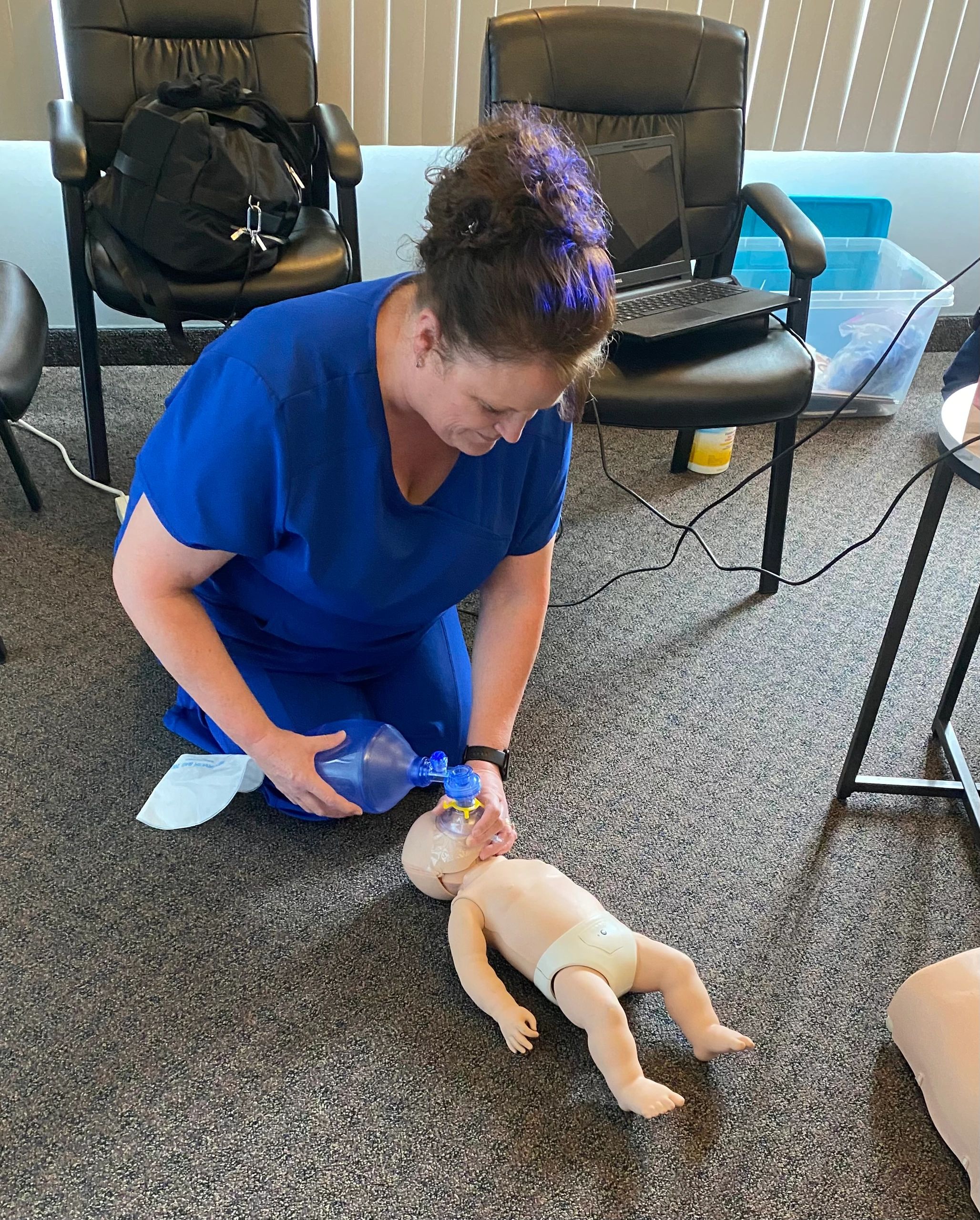 CPR rescue breathing mannequin practice